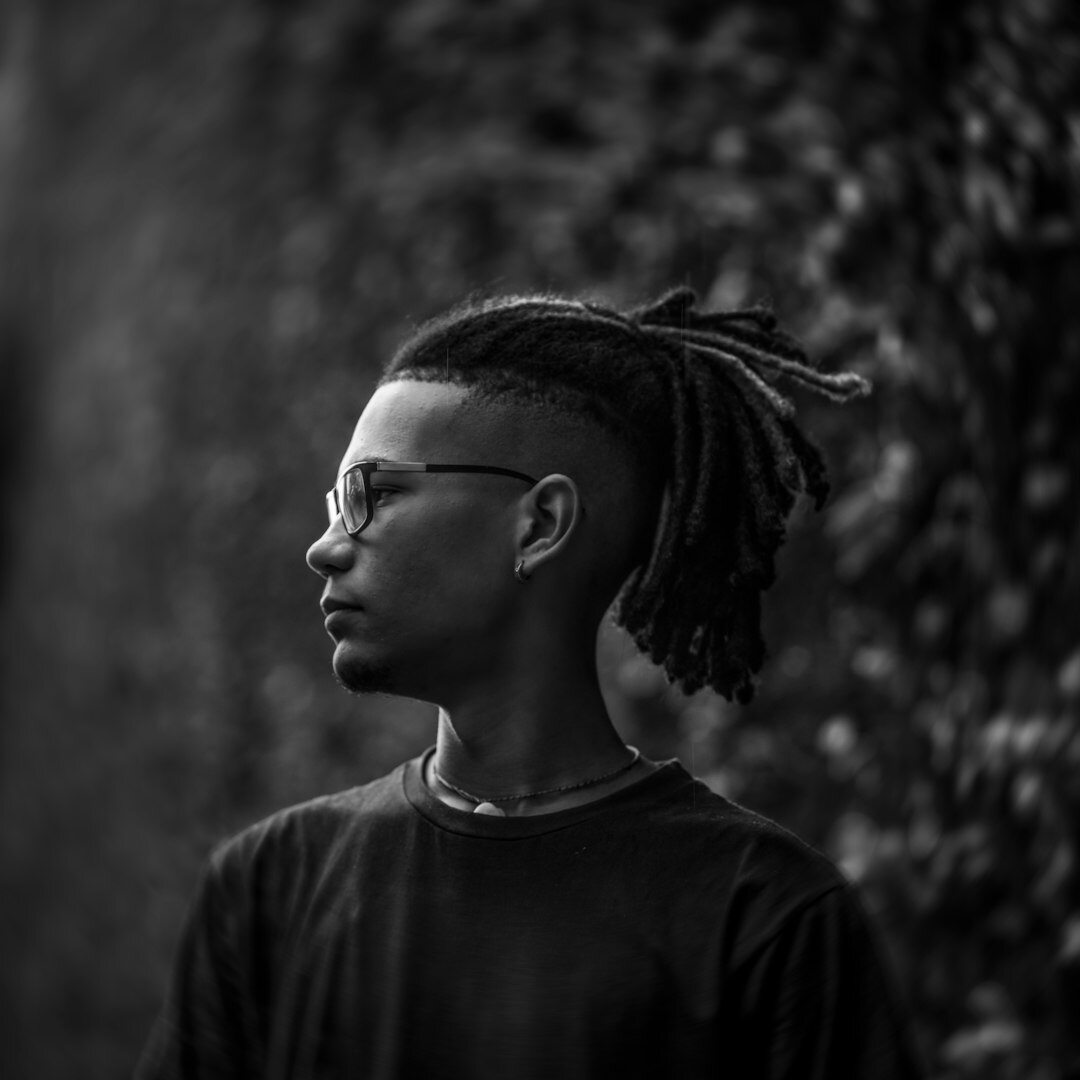 Portrait of a young Brazilian man with glasses