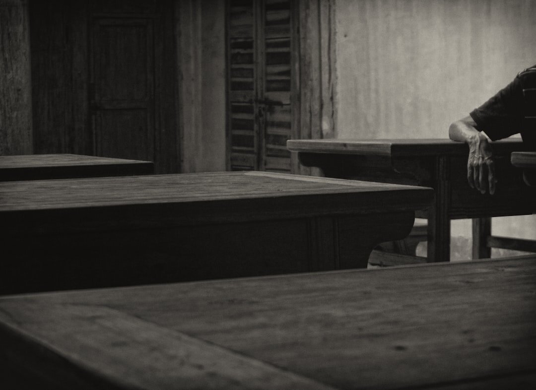 person meditating in quiet room