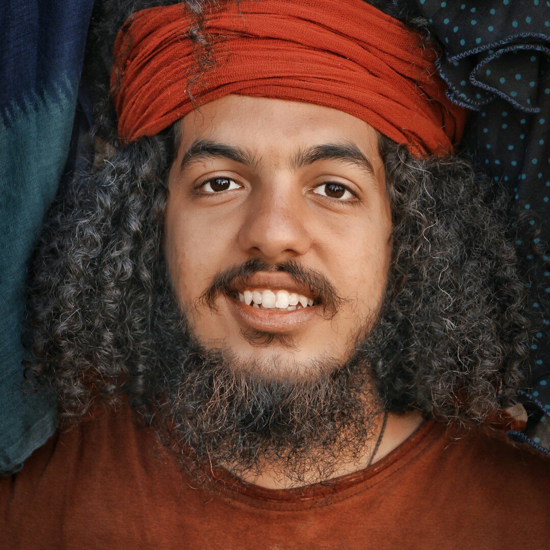 Portrait of a smiling Brazilian man with short beard