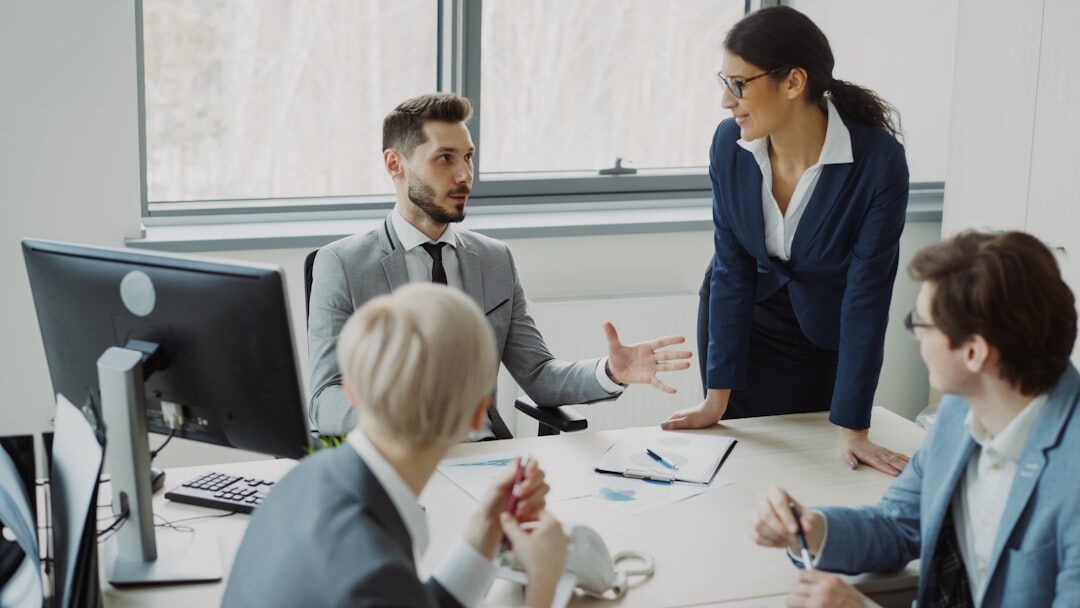 woman leading team meeting