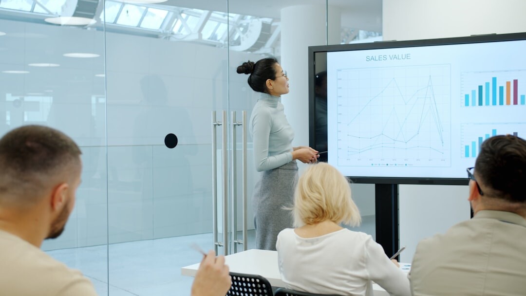 woman presenting in business meeting